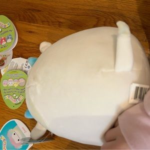 a cow squishmellow with tags(new)